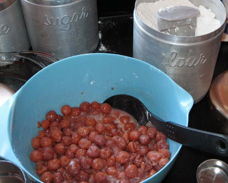 In a large bowl, dump in the cherries and the rest of the filling ingredients and mix them all together, gently but thoroughly, with a large spoon.