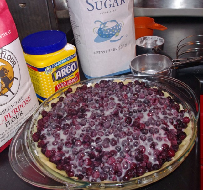 Pour the corn starch/sugar/water/lemon juice mixture over the blueberries.  